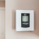 white and gray thermostat at 19 5